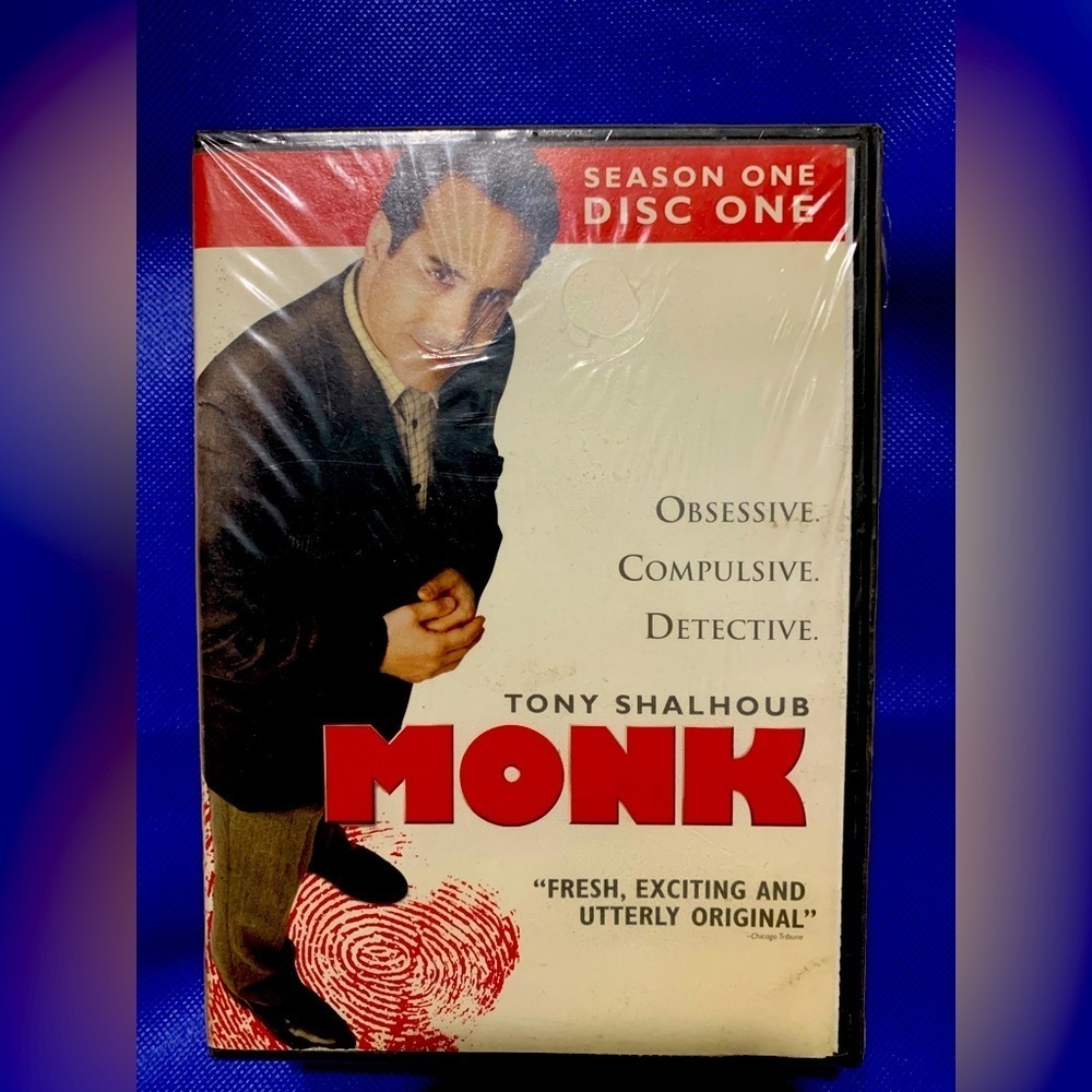 MONK Season 1 on 4 DVDs. New and sealed. Small tear in cellophane. 12 episodes.